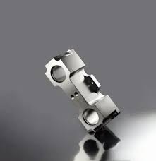 Electroless nickel plated precision component on a reflective surface